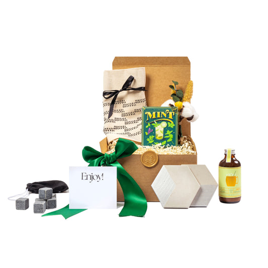Cocktail kit gift basket with a kraft box, concrete coasters made in Canada, cocktail Syrup, whiskey stones, mint seeds, and cotton napkin