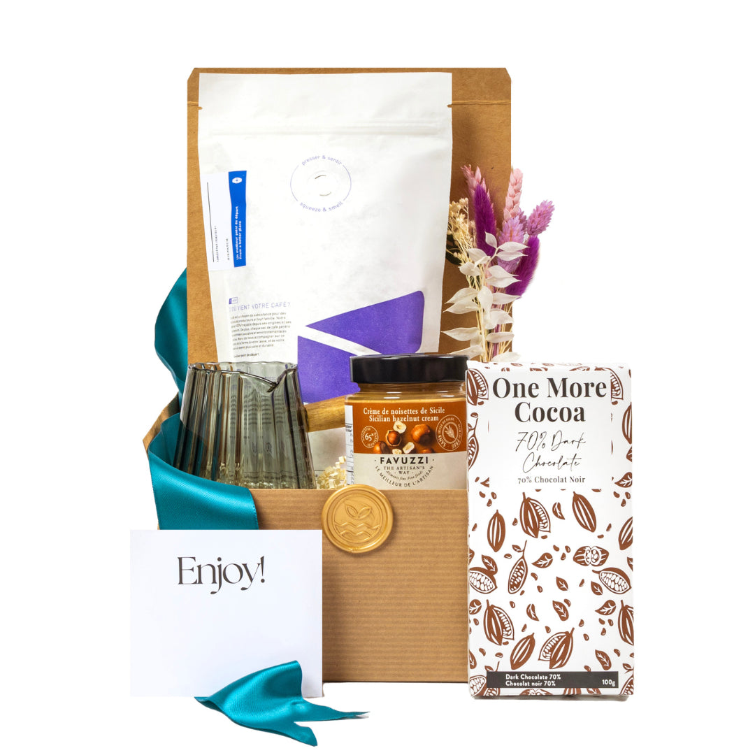 Coffee care basket packaged in a kraft box with one more cocoa dark chocolate, milk pitcher, organic coffee and Favuzzi hazelnut cream
