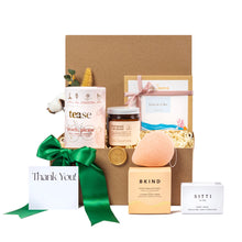 Eco-friendly gift basket with sustainable, locally-sourced products for self-care and wellness, featuring tea, natural honey, cleansing sponge, soap bar, and a handwritten 'Thank You' note; wrapped with a green ribbon. Ideal for corporate gifting, employee appreciation, or client gifts. Plastic-free, women-owned business supporting small local brands in Toronto.