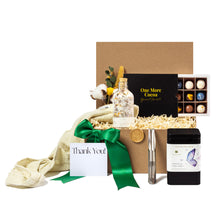 Luxury eco-friendly gift basket featuring locally-sourced products, including gourmet chocolates, herbal tea, bath salts, a sustainable tea infuser, and a soft cotton blanket. Thoughtfully curated with a 'Thank You' note, green ribbon, and natural packaging. Ideal for corporate gifts, client appreciation, housewarming, or employee recognition. Toronto-based, women-owned small business promoting sustainability and zero-waste solutions