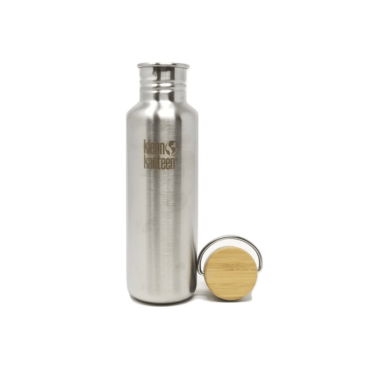 Klean Kanteen Reflect Plastic Free Water Bottle 27oz open with its cap next to it